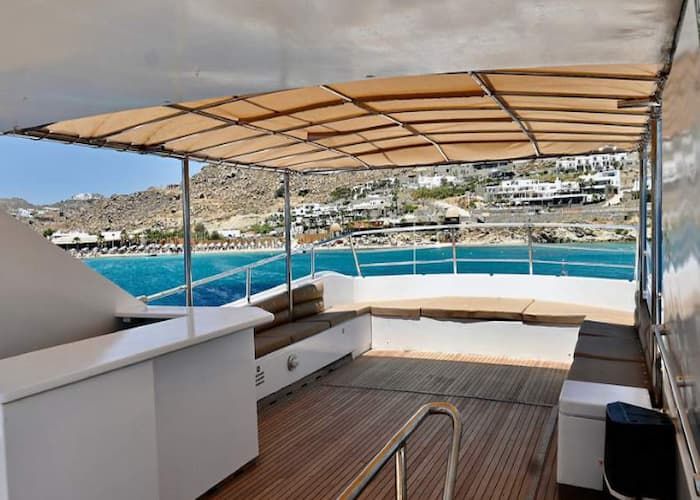 luxury boat deck, party boat Mykonos, Mykonos boating